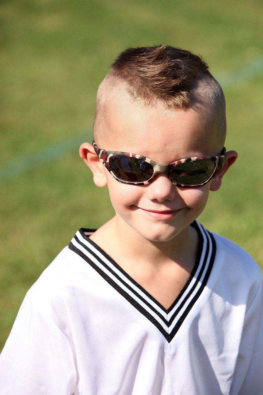 Tyler Roads, 5, wore some fun sunglasses during his soccer game with his team the Angel Fish Saturday, Sept. 8 at Glebe Park.