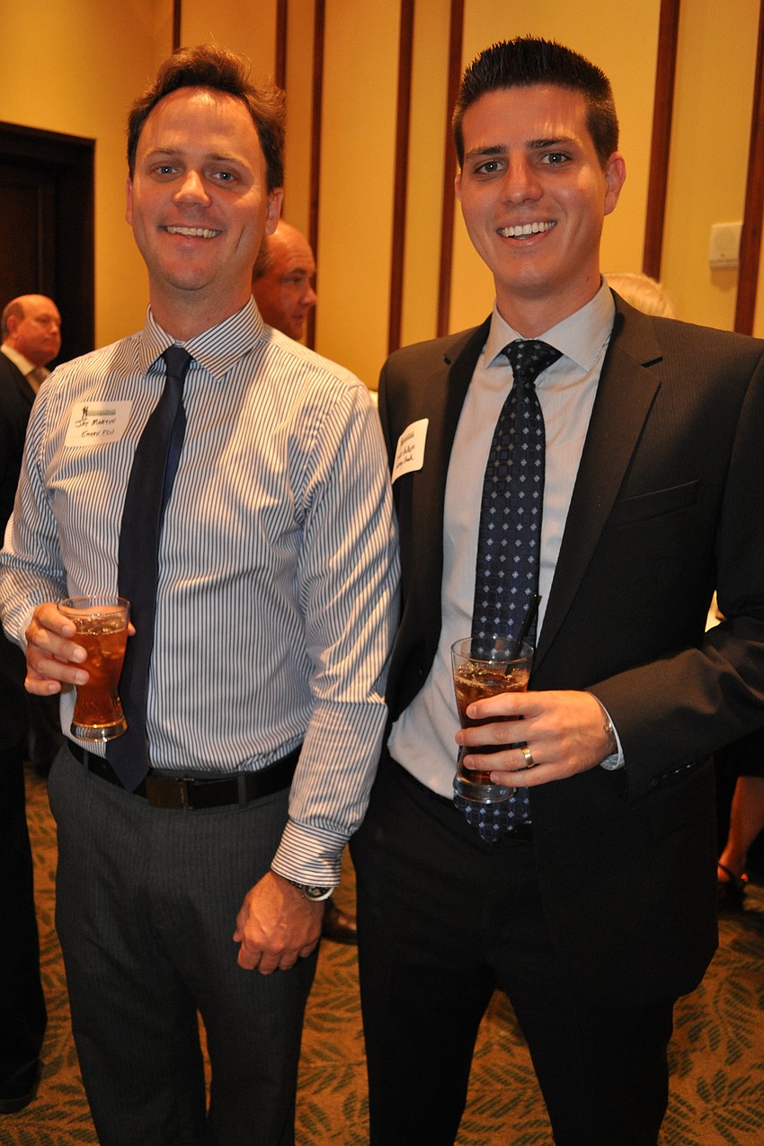 Jay Martin, of Emery Federal Credit Union, with Jordan Hallam, of Gateway Bank