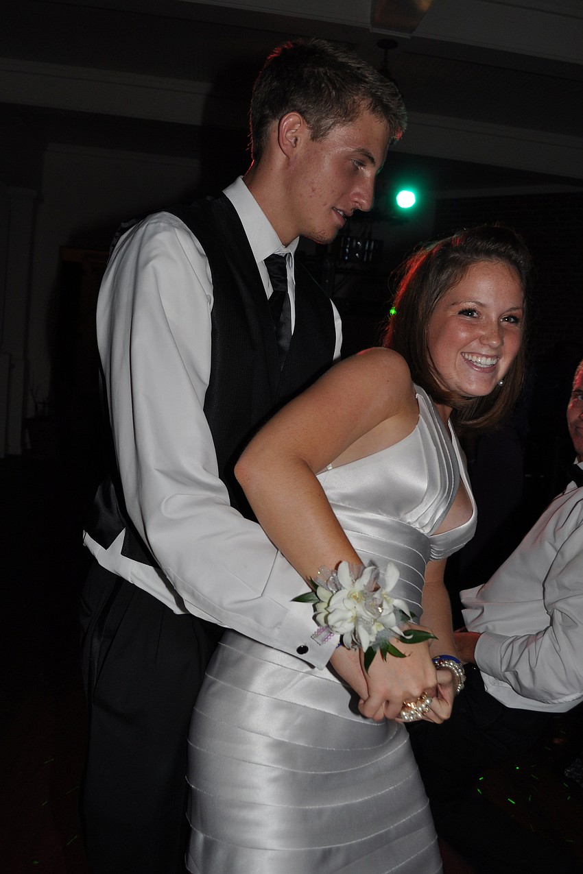 Katherine Berg kept her date, Grant McCarthy, glued to the dance floor.