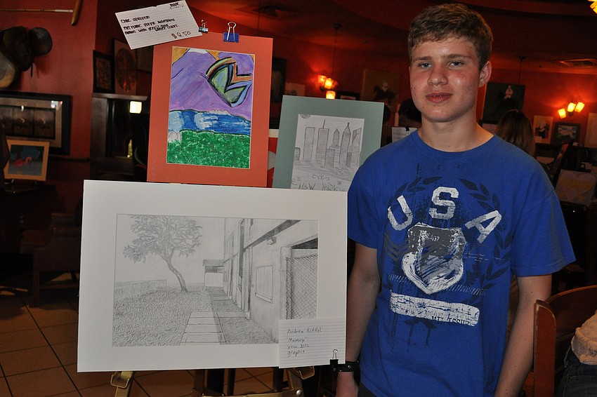 Andrew Riffel showed off his piece, 