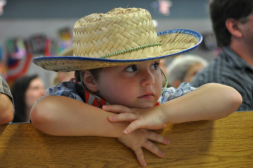 Blake Bischoff, 4, eagerly watches the performance.