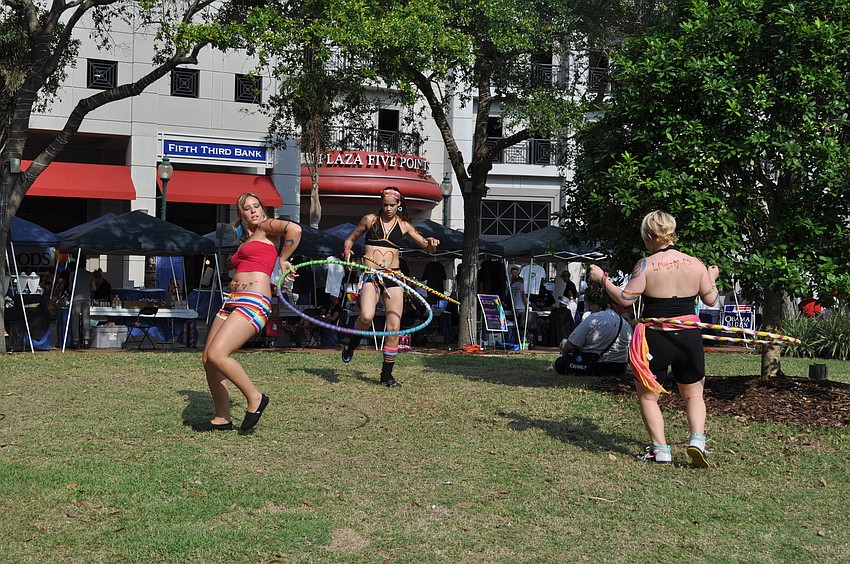 Hula hoop dancers enjoy the live music.