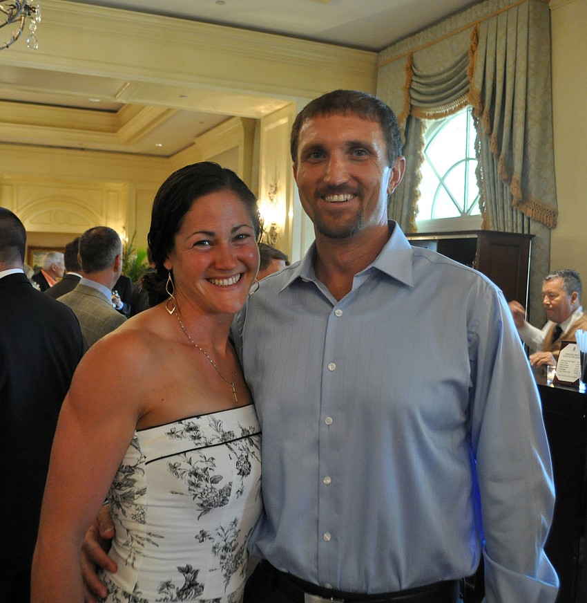2008 Olympian Jen Goldsack and freshman boysâ€™ coach Andy Berster