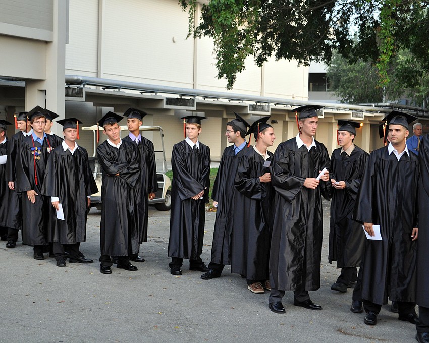 Students wait in line before the ceremony.