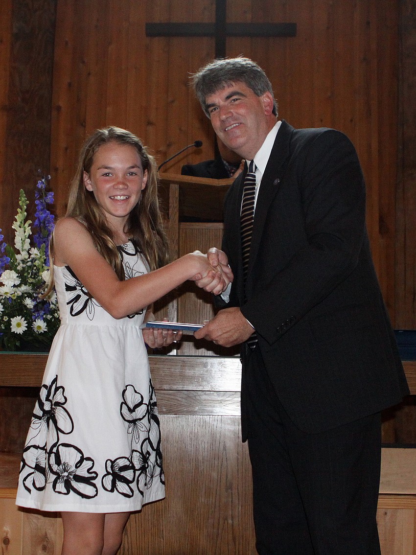 Abby LaGasse received the Sportsmanship Award from Headmaster David Mahler, Friday, June 1, at Siesta Key Chapel.