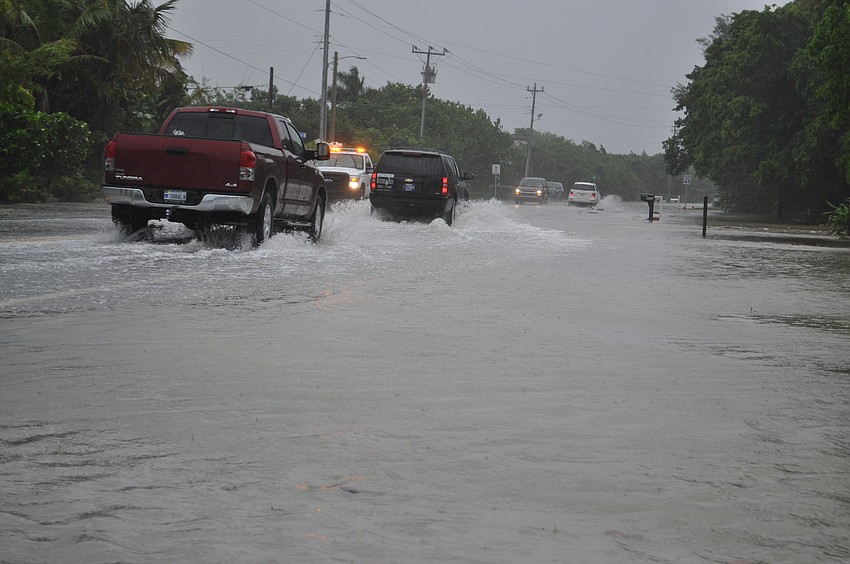 The 6000-block of Gulf of Mexico Drive was completely under water on Sunday afternoon.
