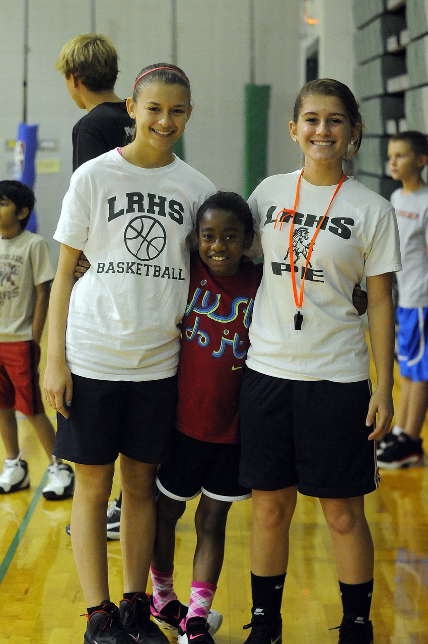 Jaela Dennis, who turns 10 years old July 5, enjoyed spending time with her favorite coaches Emily Walser and Kalei Vicars.