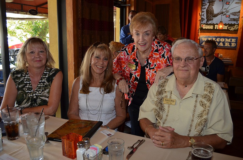 Sheila Lewis with Siesta Sports, Sondra Cook with Our Town and Terry and Kay Day with Senior Moves