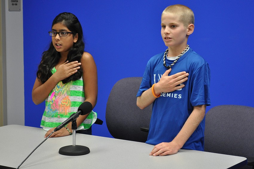 Ishvina Singh and Robby Goecker anchored the morning news for Gullett, leading students in the Pledge of Allegiance.
