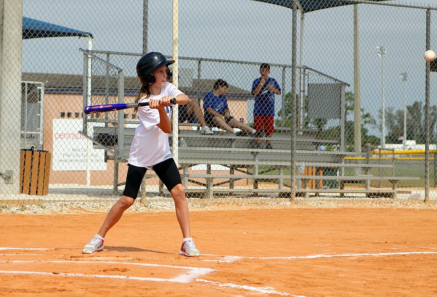 Chloe Keegan gets ready to hit the ball Friday, April 29 during the Ashton Elementary fifth grade World Series day at Twin Lakes.