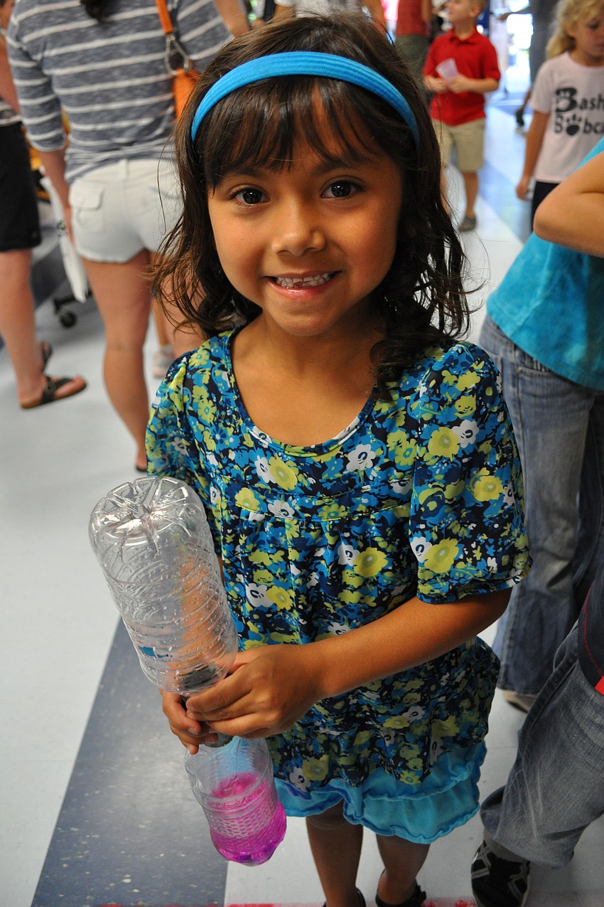 Emily Lama, 6, stopped by several exhibits.