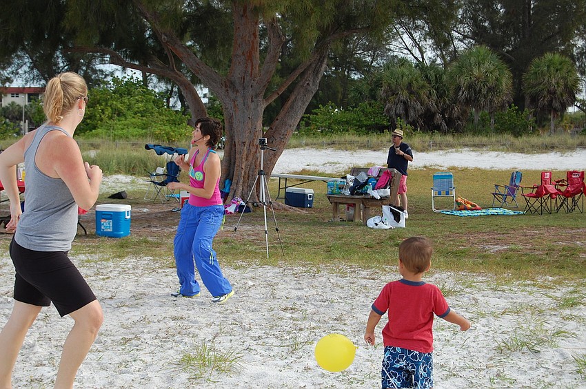 The Zumba class brought dancers as well as curious onlookers. Here Luz Ruiz-Tagle shouts encouragement to participants.