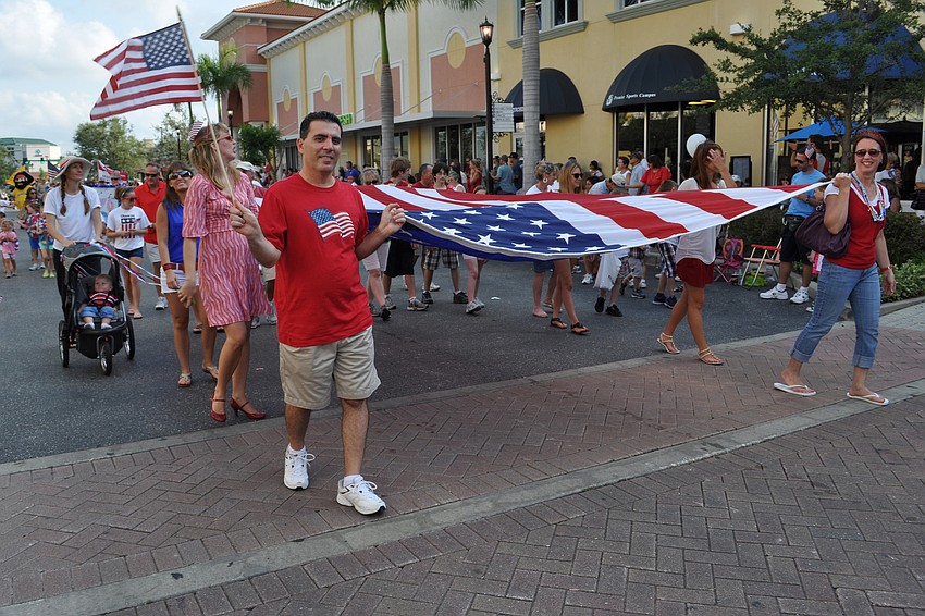 The Observer Group carried an American flag.