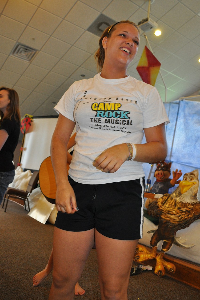 Rachel Gross, 15, led the children in dances to songs.