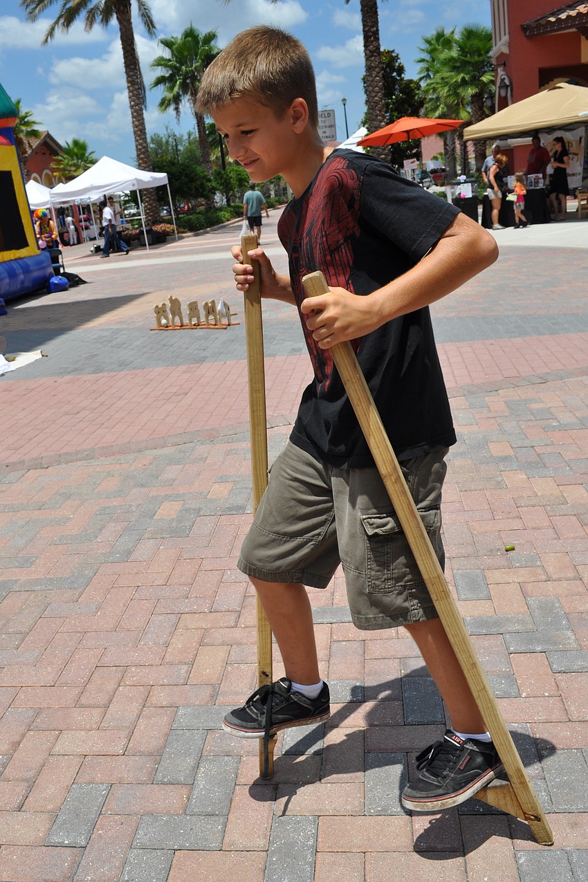 Walking on sticks proved to be harder than 12-year-old Danny Yoder expected.