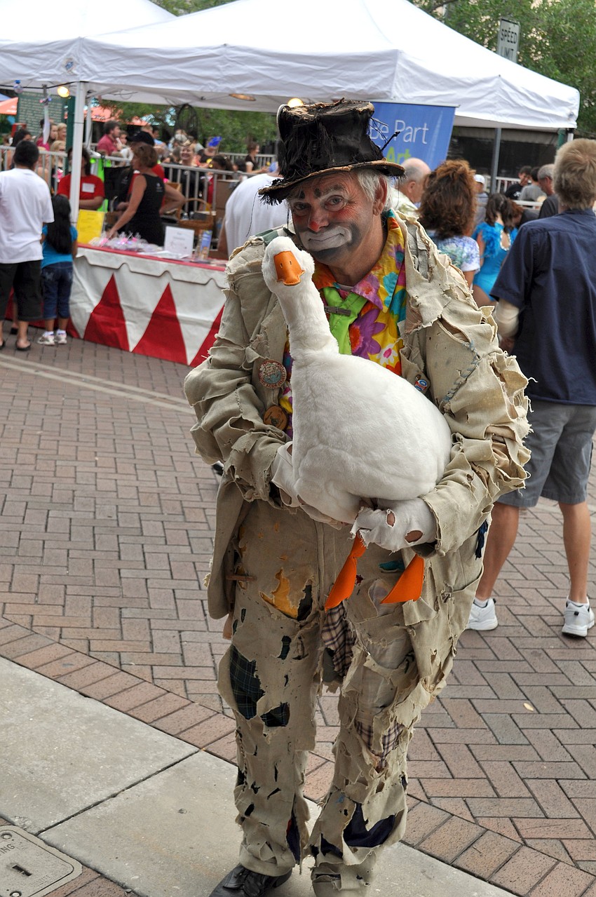 Levoie Hipps, a coach at Sailor Circus, shows off his goose puppet.