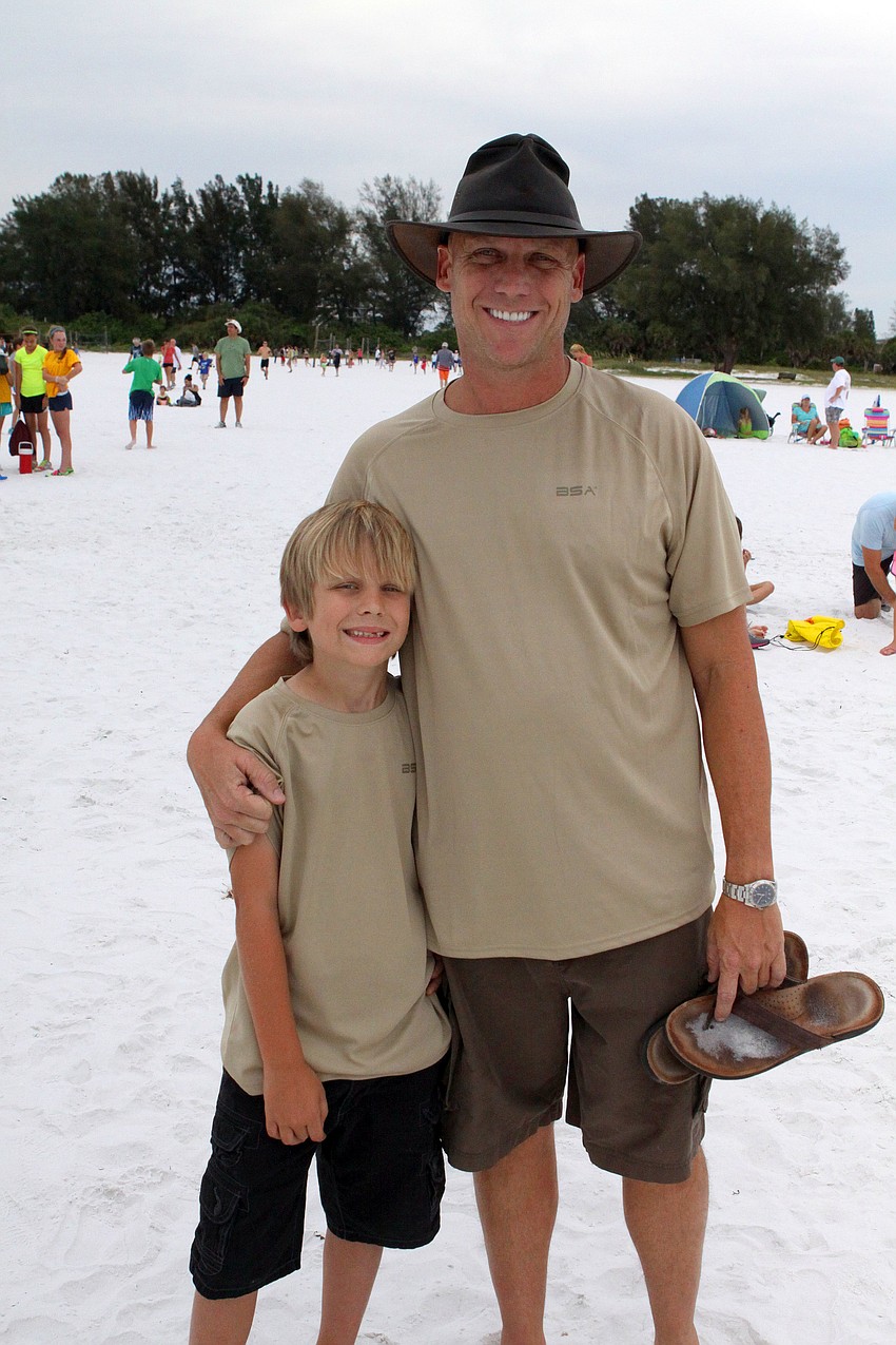 Stephen Schadt, 8, poses with his dad, Steve Schadt. They both ran in the Summer Fun Run, Tuesday, June 19.