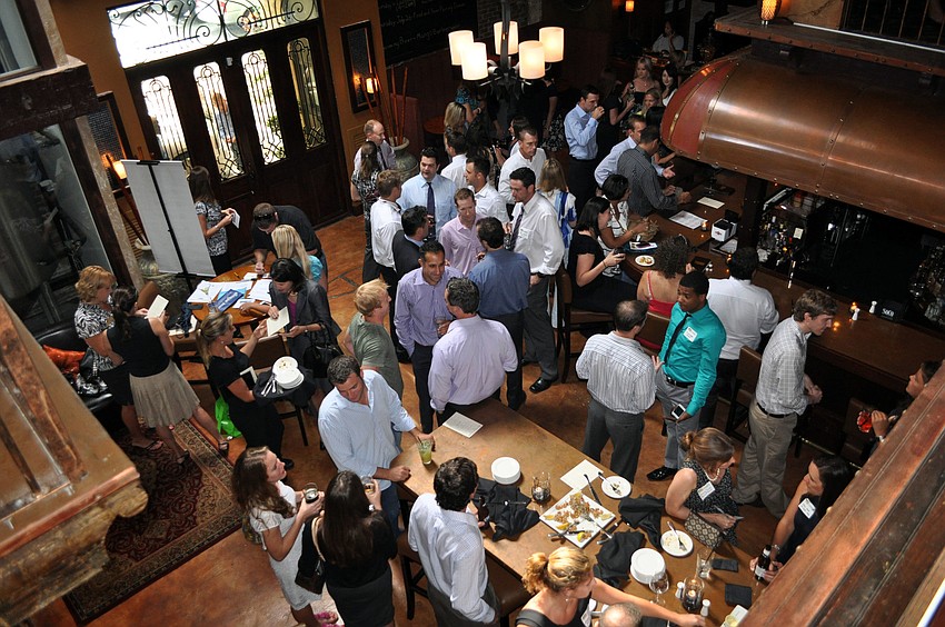 The Young Professionals Group of Sarasota held their monthly after hours, Thursday, July 12, at Darwinâ€™s.