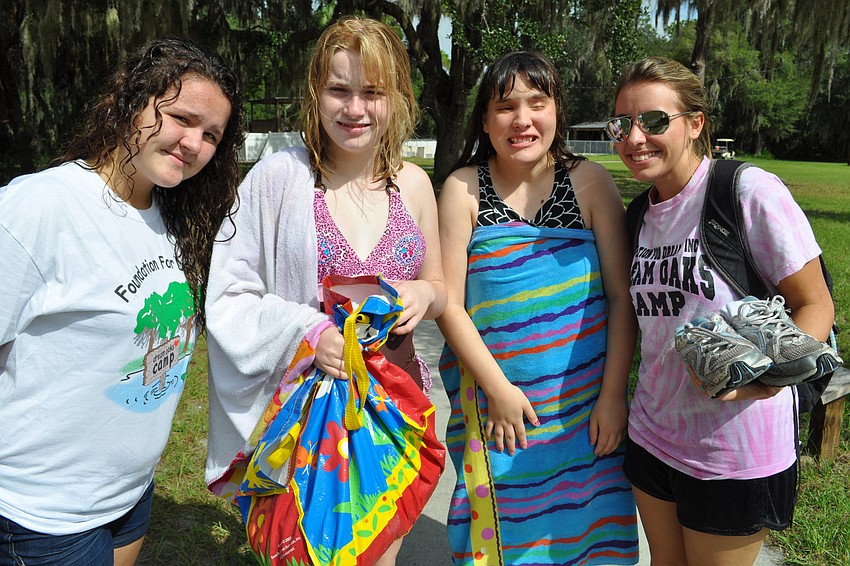 After swimming, Isabella Bankes, Angela Berk, Sarah Markens and Elizabeth Ivey were eager to get to their next set of activities.