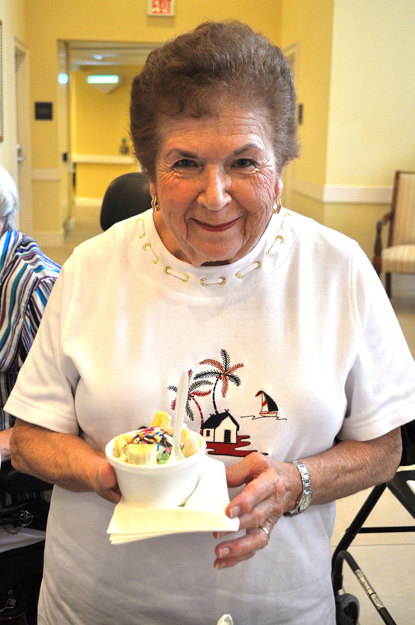 Mercedes Jimenez shows off her ice cream sundae.
