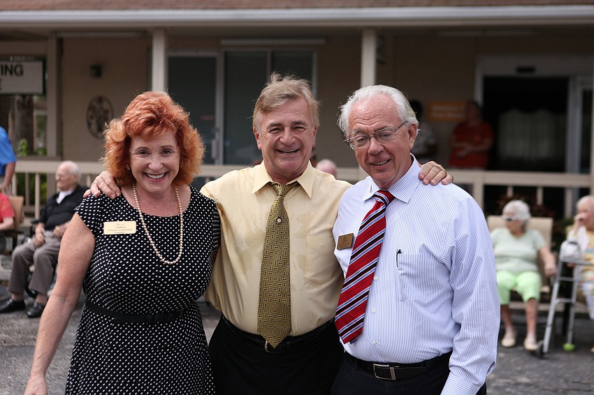 Estelle Crawford, President of Pines Foundation, Dr. Jacques Esclangon, President of the Rotary Club of Sarasota Bay Foundation, and John Overton, President of Pines of Sarasota