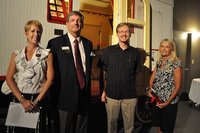 Nichole Lindsay with Tannenbaum Scro, Mark Hanewich with Tannenbaum Scro, Larry Hale with Hale Edwards Associates and Debbie Lamb with Signs Now