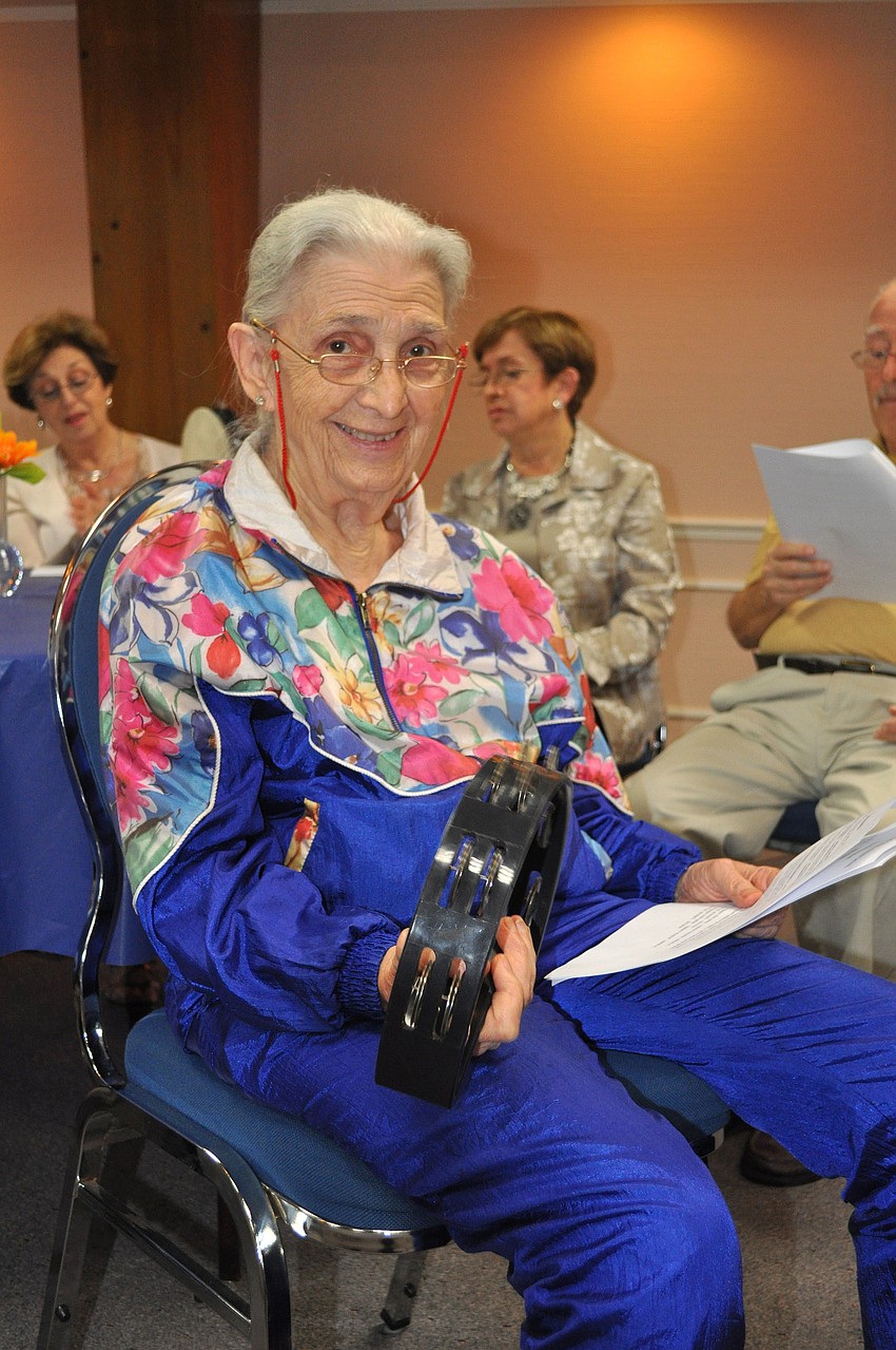 Ruth Simons had fun playing the tambourine.