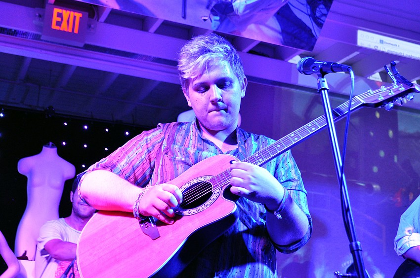 Jake Elrod slides up to hit the high notes.