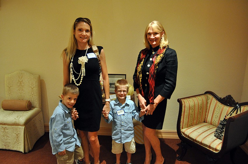 Megan Toale with her sons, Landon and Gavin, and Syndi Toale.