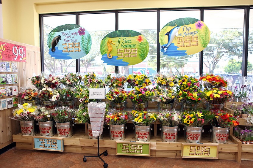 Buckets of flower bouquets with varying pieces were some of the first things on the right hand side of the store that customers saw when they walked in.