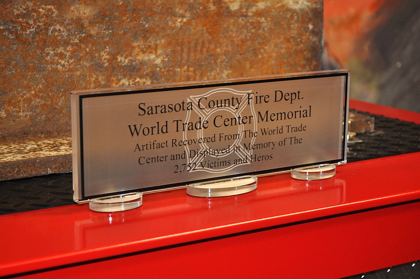 A piece of plexi-glass attached to the base explains the significance of the artifact.