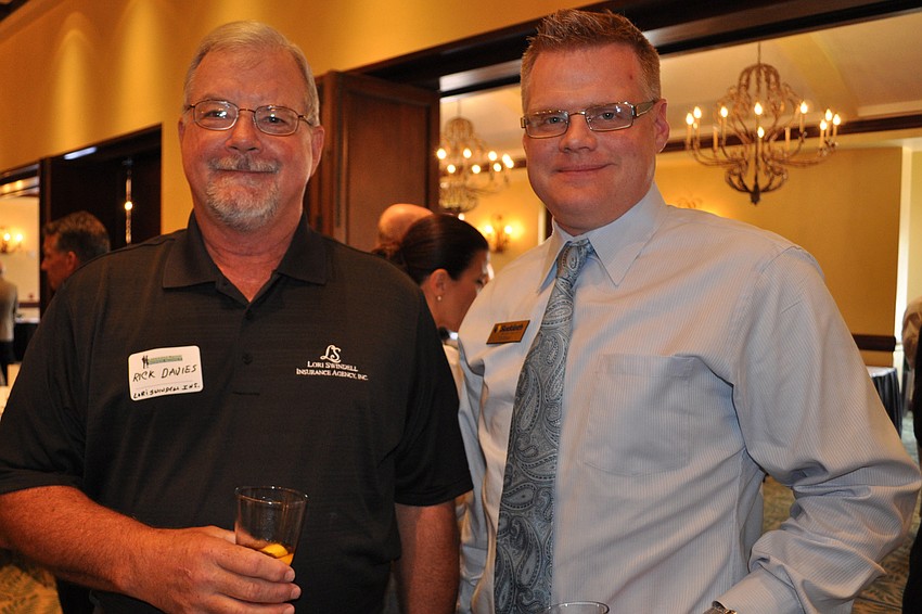Rick Davies, of Lori Swindell Insurance, and Tim Estep, of Suddath