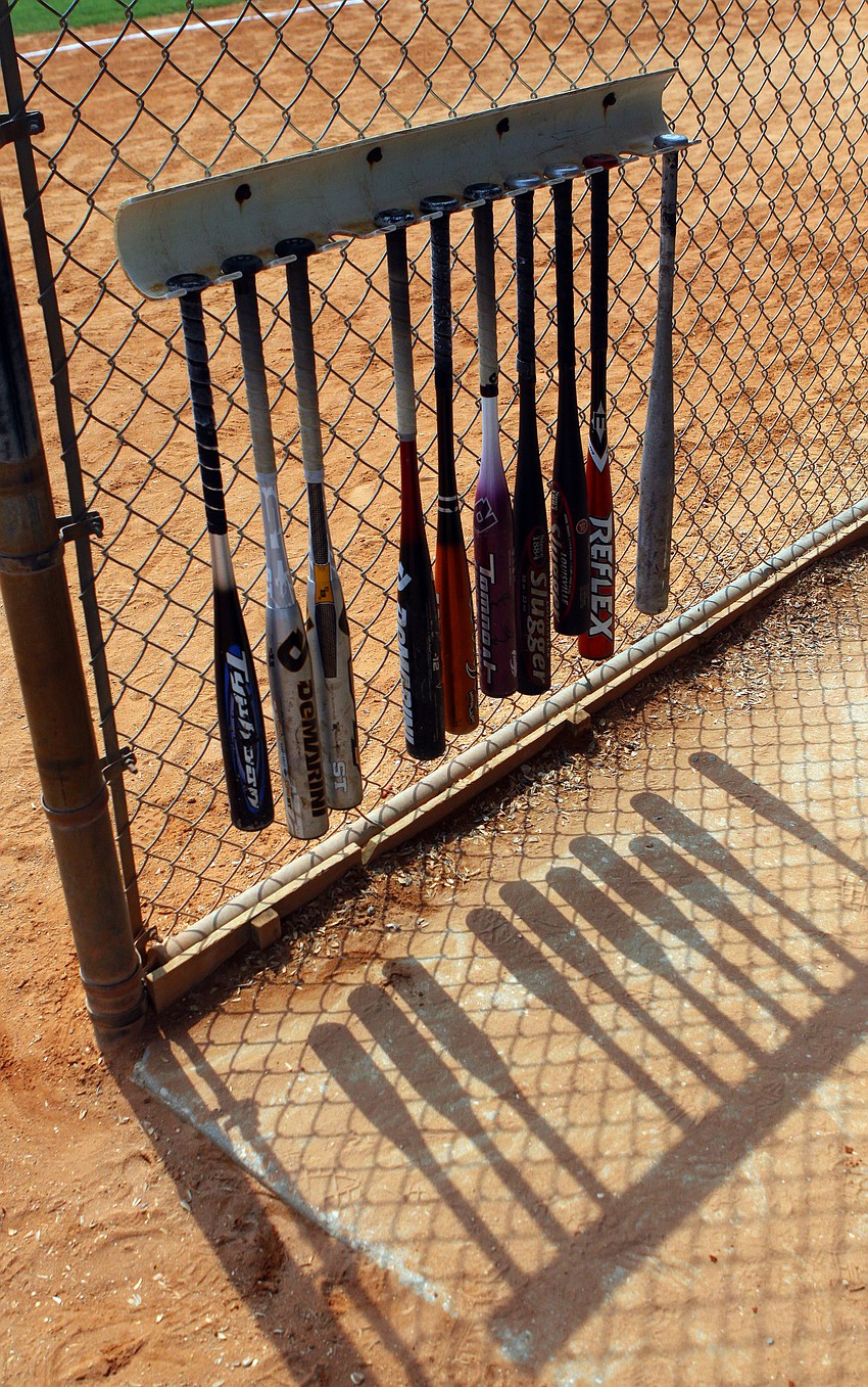 Baseball bats cast a shadow in the 1947 Brooklyn Dodgers' dugout.