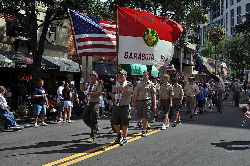 The Boy Scouts make their way down Main Street during the Memorial Day parade, Monday, May 28.