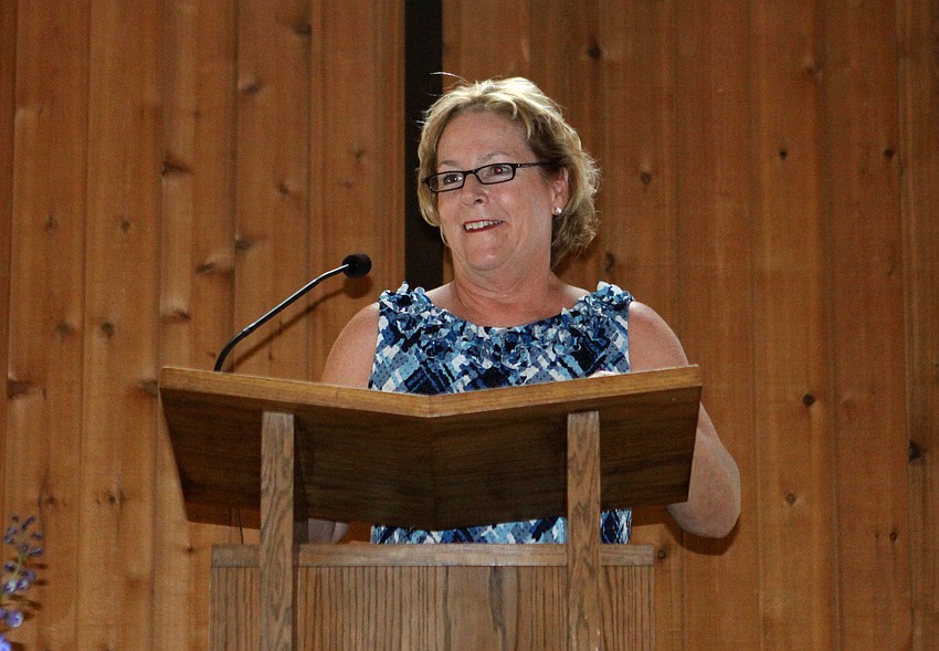 Pamela Davis, who has been with Out-of-Door Academy for 35-years, talks to the 6th graders about heading up to the Uihlein Campus in Lakewood Ranch.