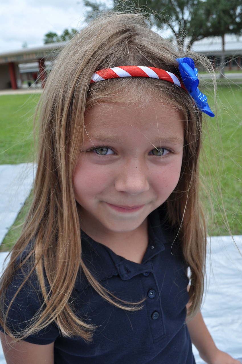 Danielle Vogel, 7, dressed patriotically for the day.