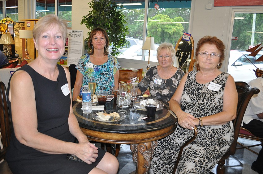 Recipientâ€™s mom and volunteer Madelyn Sams with grant recipients of North Port Art Center Clare Harvey, Sandi Hilliard and Bonnie Rodgers.