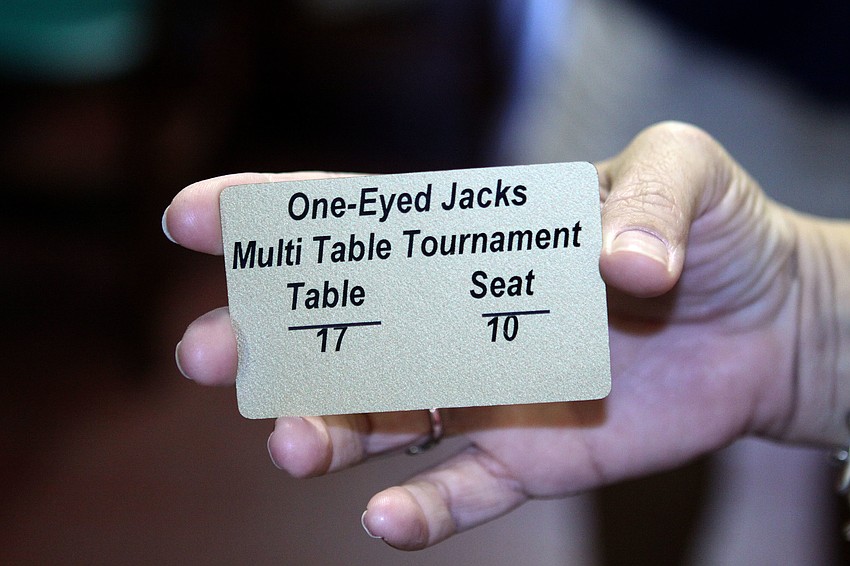 Each player got a tournament card with a table and seat number.