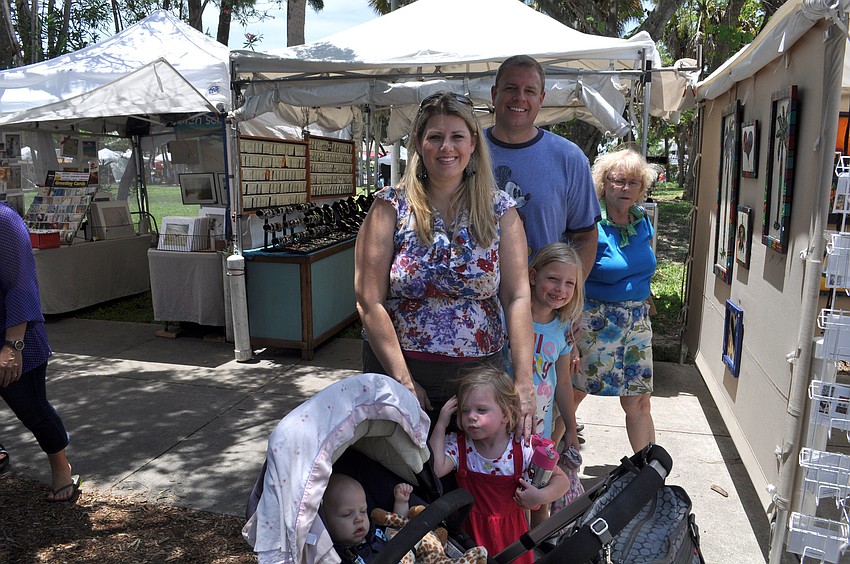 Anastasia and Eric Konczal with their children, Ezekiel, Avonlea and Hartleigh.