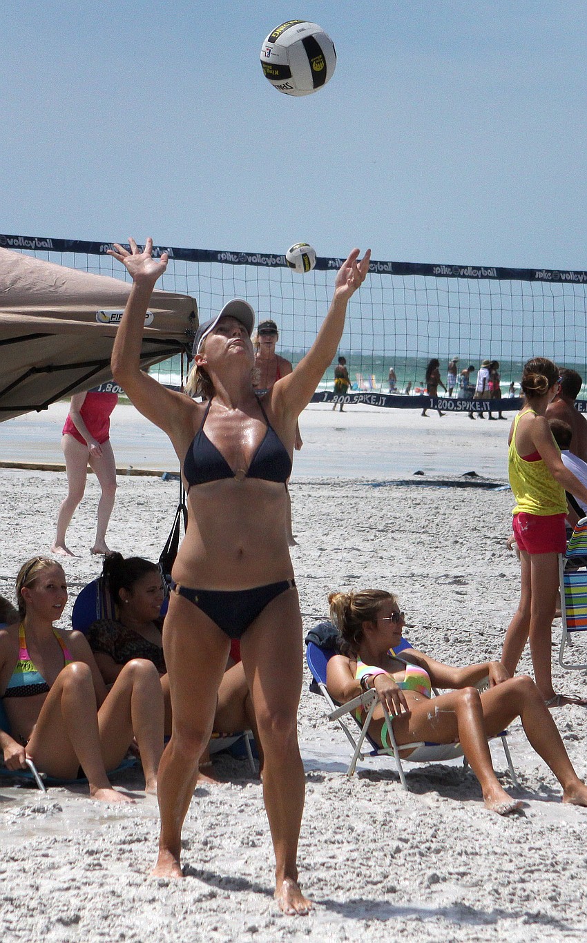 Dawn Meyer serves to the other team, Saturday, June 9.