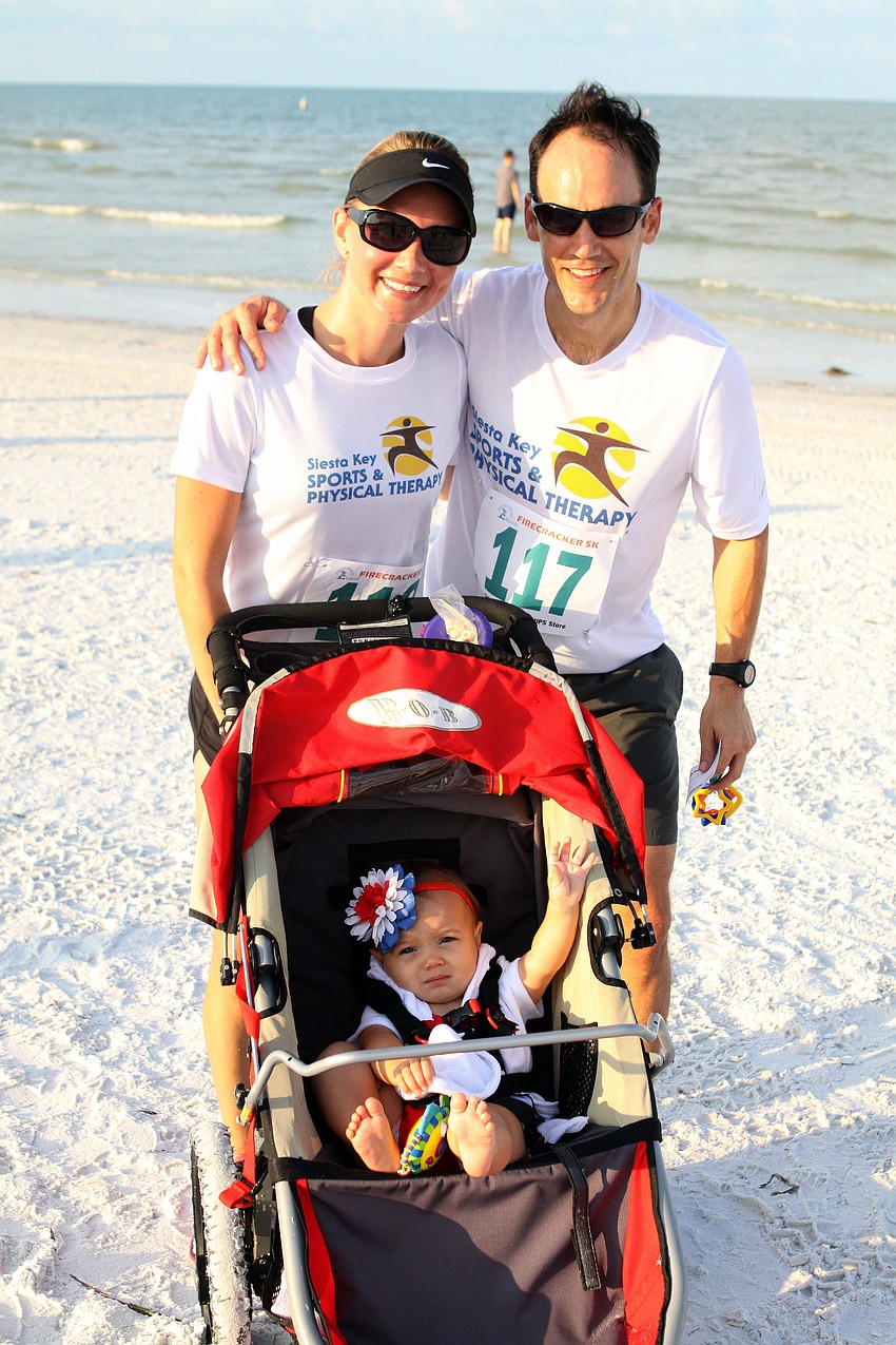 Kristy and Dave Ochsendorf with their one-year-old daughter, Jessie.