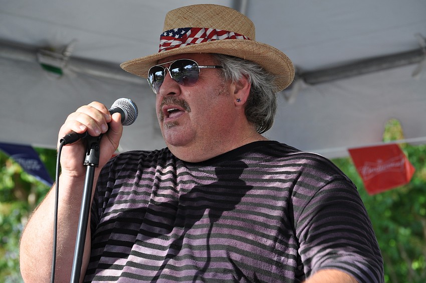 Big T and the Tornadoes keep the crowd entertained.