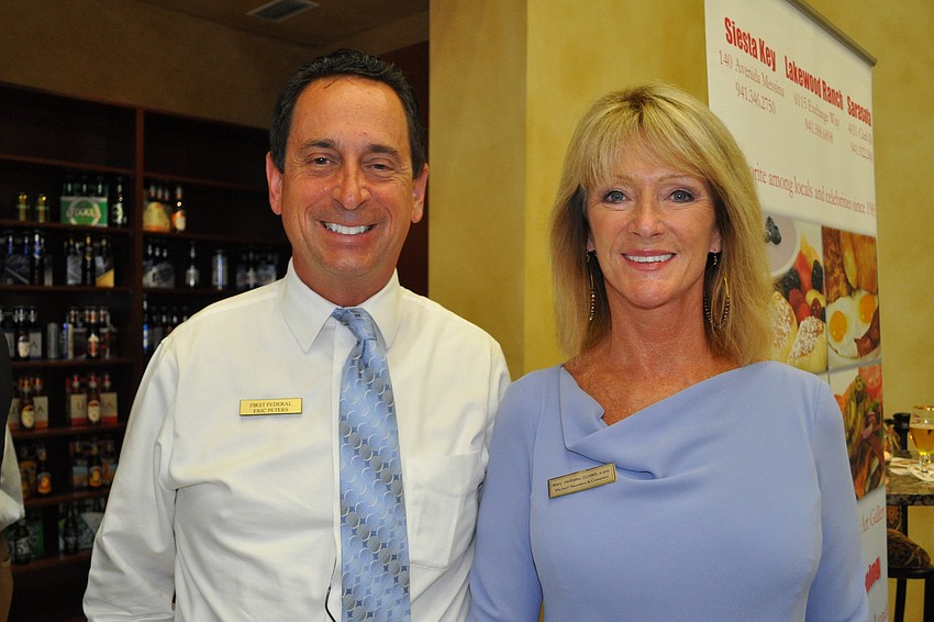 First Federal's Eric Peters with Michael Saunders & Co.â€™s Mary Hellhake