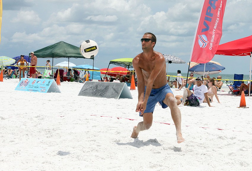 Kent Ammons goes to bump the ball during a midday match.