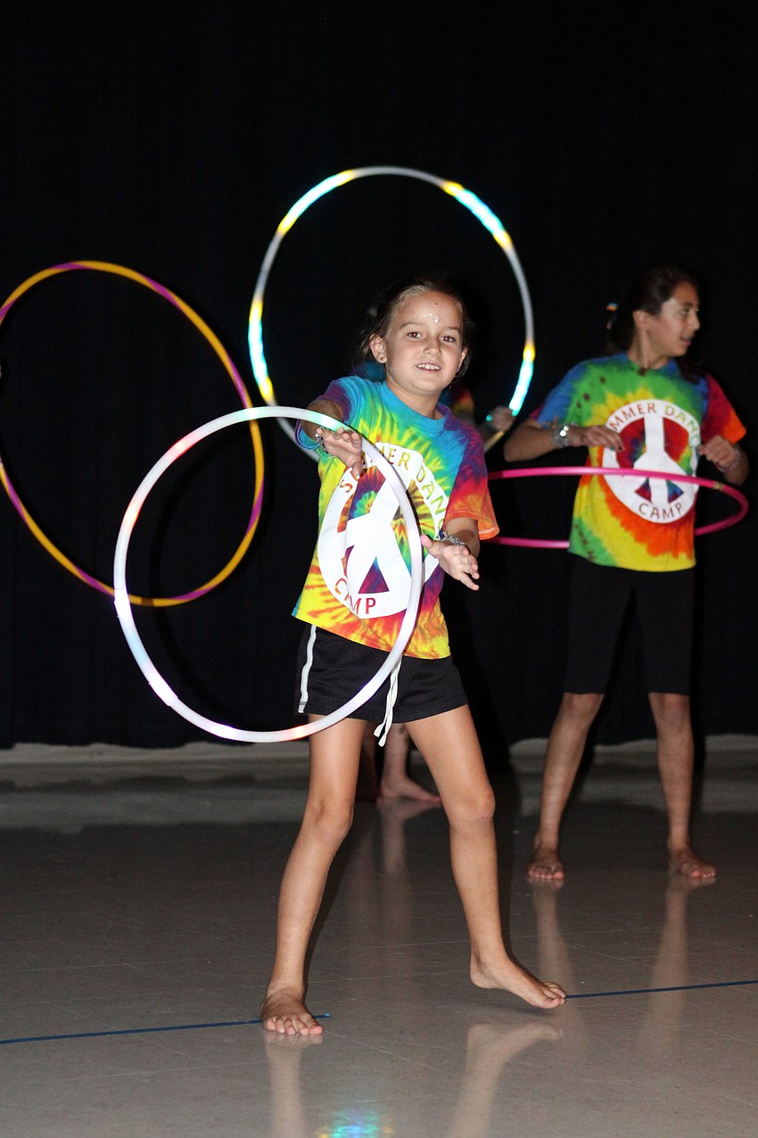 Hannah Tisone, 8, dancing to the song â€œWe run the nightâ€.