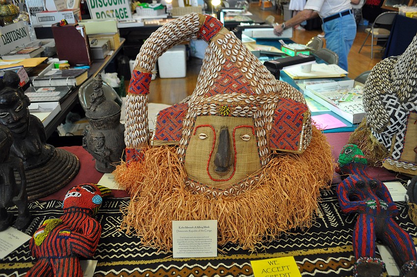 This mask, from the Democratic Republic of Congo, is worn by royal dignitaries during initiation and funeral ceremonies. The curved portion on the top of the mask represents an elephant trunk, which is a sign of kingly power.