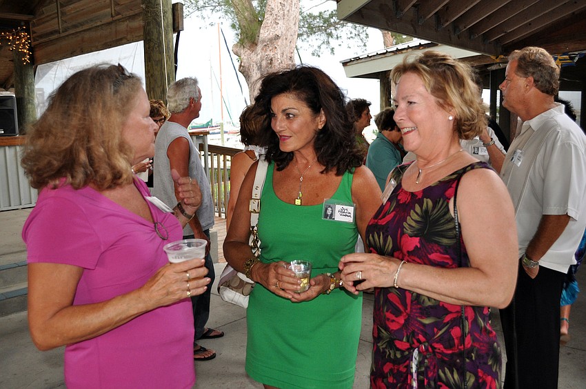 Janet Sayley Meinhart, Susi Abdulla Walkea and Pamela Leonard Davis chit-chat with one another Friday night at the kickoff party for the Sarasota High School Class of â€™72 reunion.