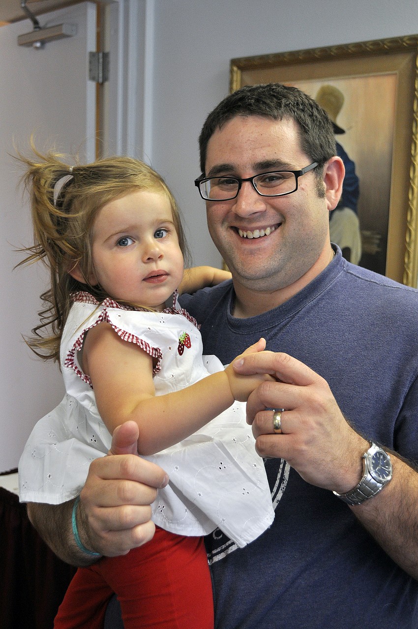 Sam Rozenberg with his daughter, Rachel, 2 Â½ mos.
