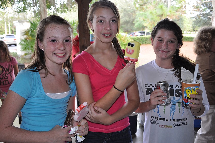 Olivia Marquis, Jessica Apatow and Abby Zion feast on ice cream.