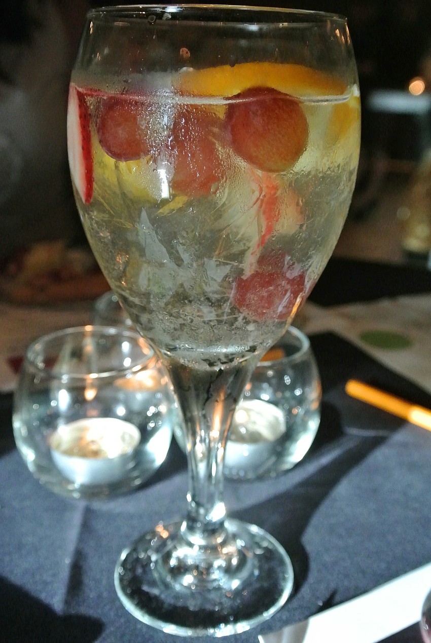 The clerico â€” AKA sangria blanco â€” is made with dry white wine, superfine sugar, banana, orange, peach, red apple, lemon juice, red grapes and club soda.